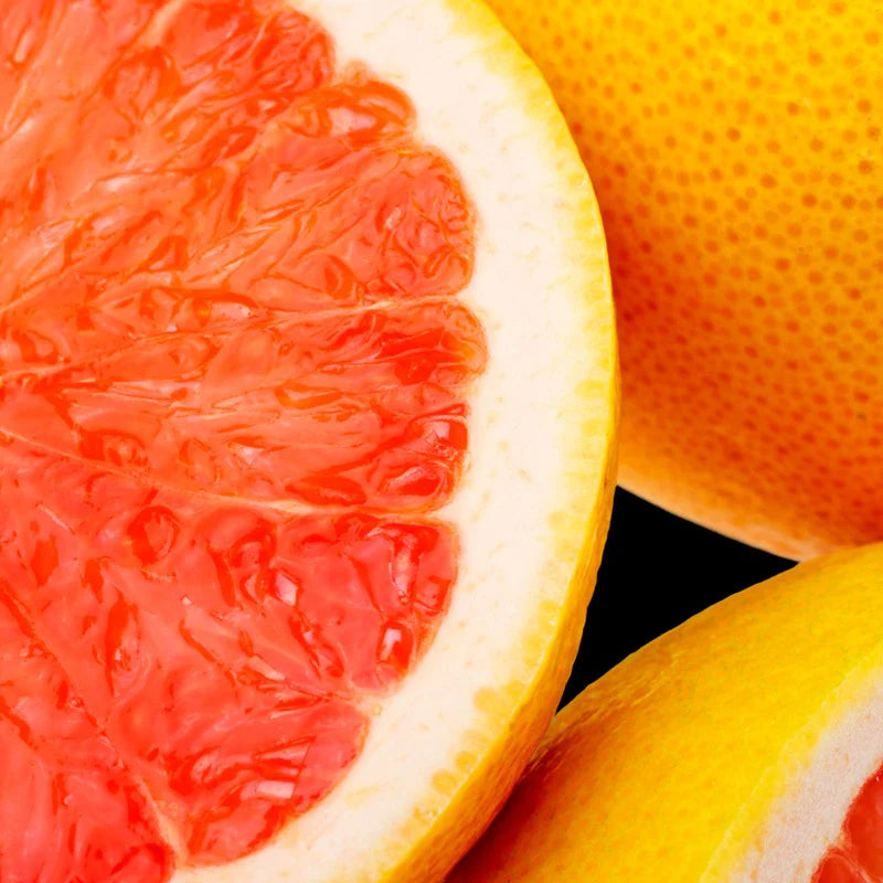 a close up of a grapefruit cut in half