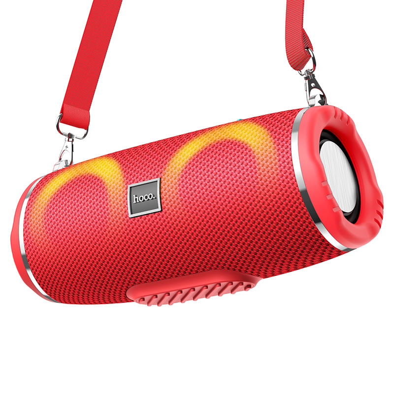 a bluetooth speaker with a red strap