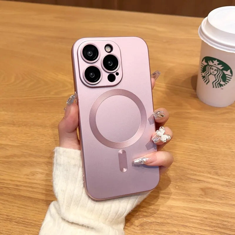 a woman's hand holding a pink iphone case