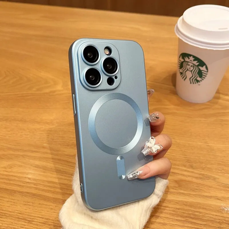 a woman's hand holding a phone case with a starbucks cup in the background