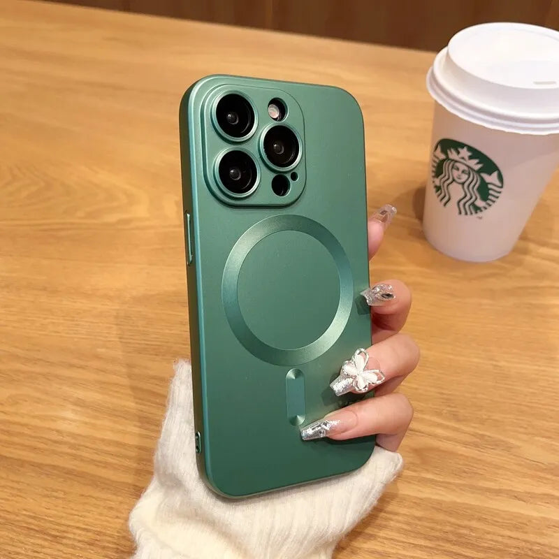 a woman holding a starbucks cup and a green phone case