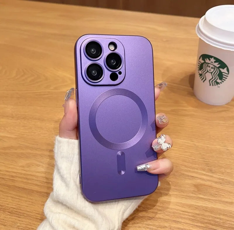 a woman's hand holding a purple phone case